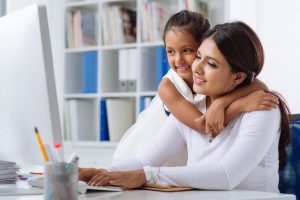 woman and daughter on computer looking for a divorce lawyers near me