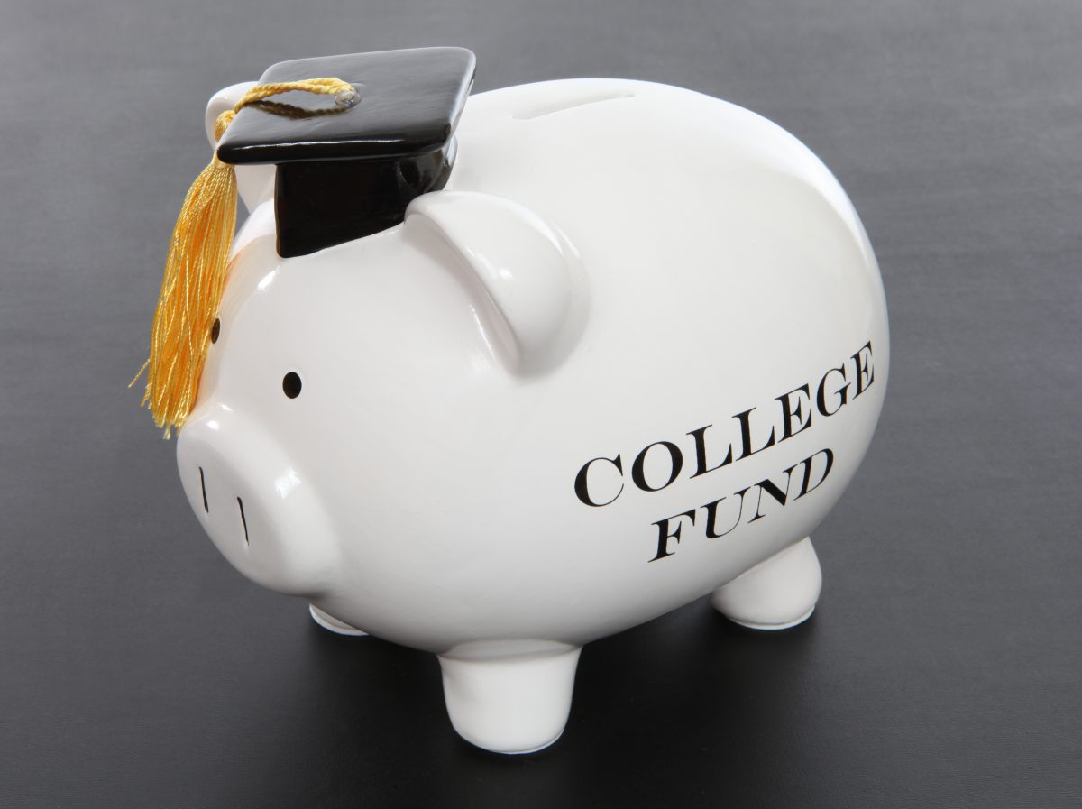 Piggy bank with college fund for when determining tuition payments with Child Support Lawyer Sterling Heights